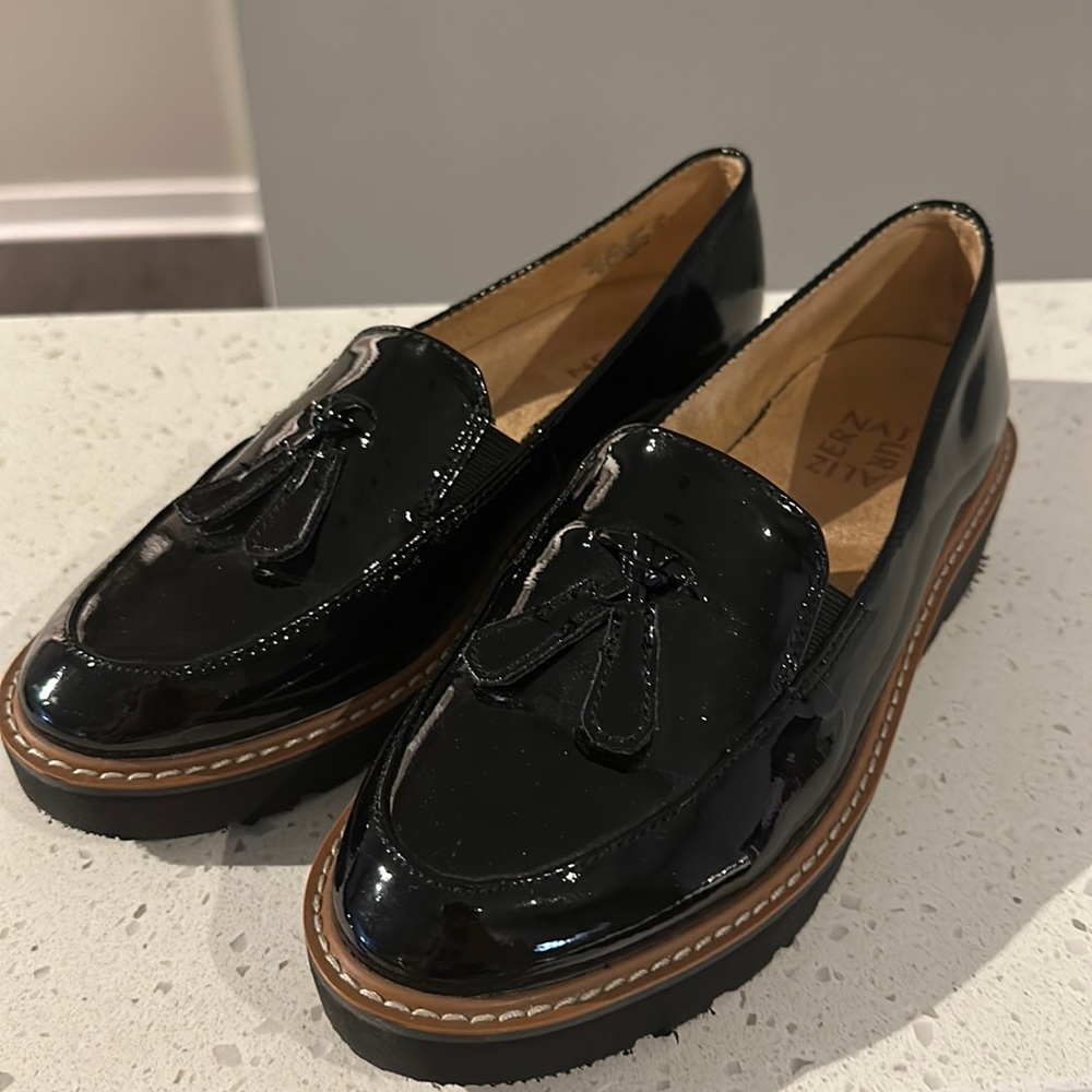 Black loafers never worn